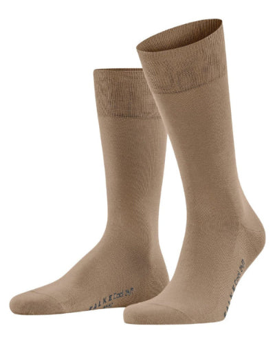 A pair of mid-calf socks in a solid tan color, shown against a plain white background. The brand name 'WALKED TO END' is printed in black near the toes.